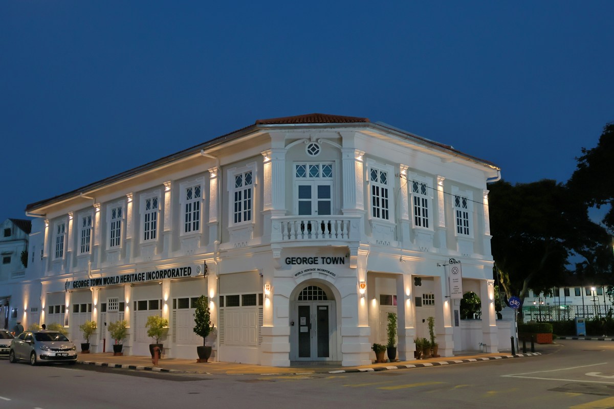 Historic colonial building illuminated at dusk